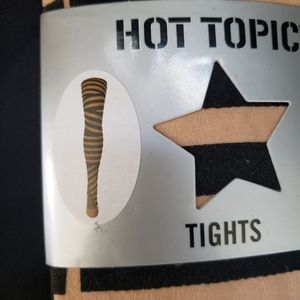 Black and nude striped patterned tights